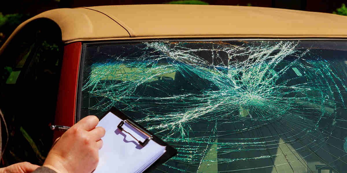 can you pass inspection with a cracked windshield​